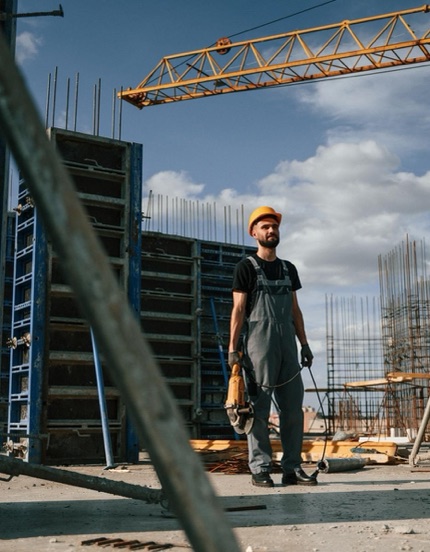 Workers assembling formwork on site